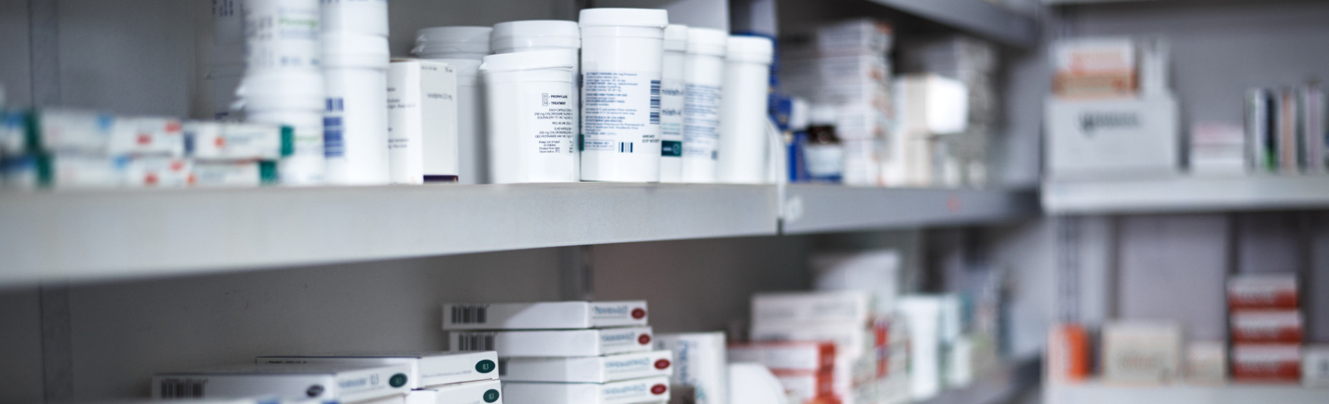 retail pharmacy shelf with various medications