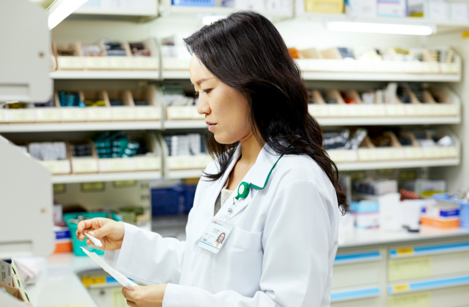 hospital pharmacist looking at medication information
