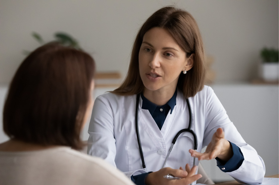 doctor talking to her female patient