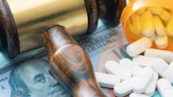 prescription drugs, judges gavel, and money