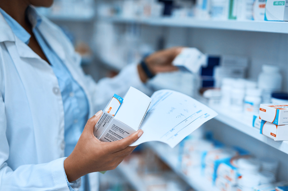 pharmacist looking at medication stock