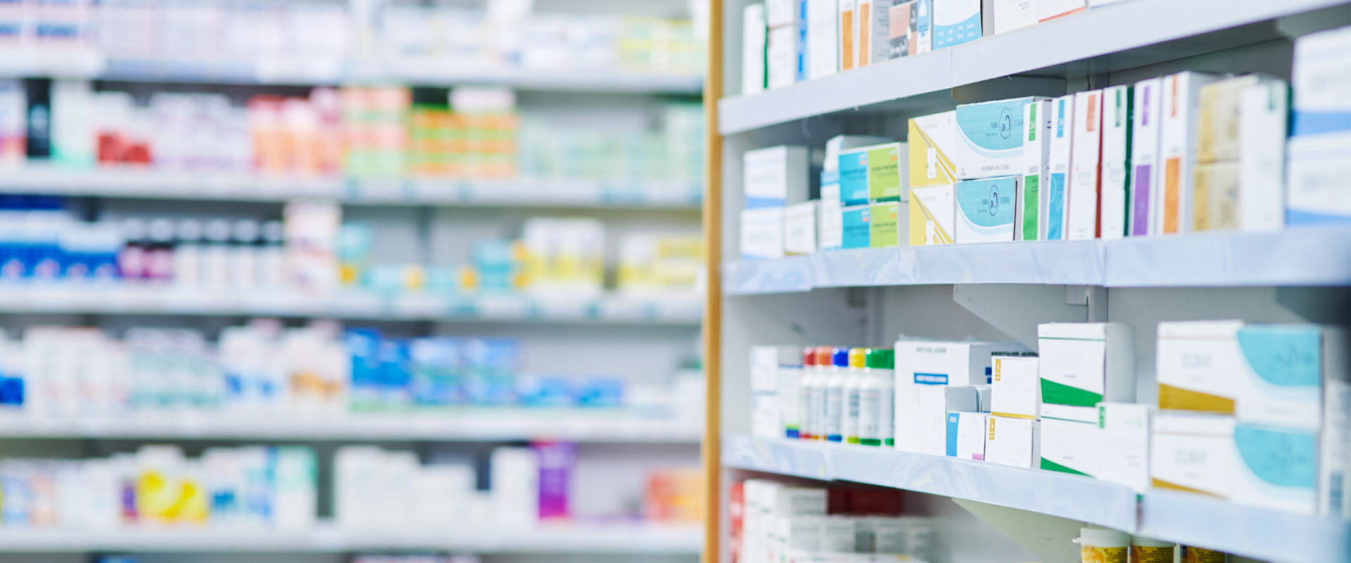 retail pharmacy shelves filled with medication