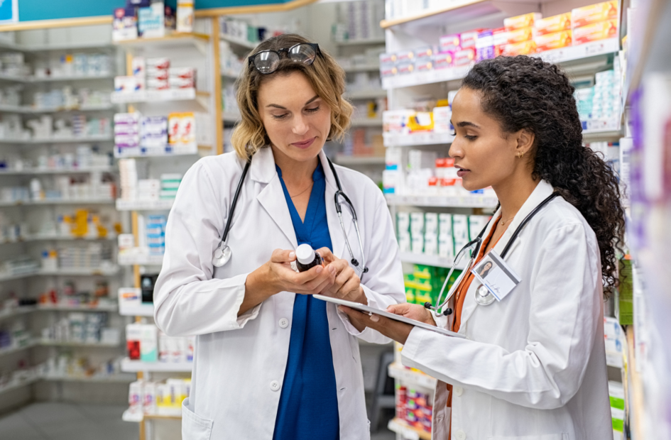 two retail pharmacists working together in the pharmacy