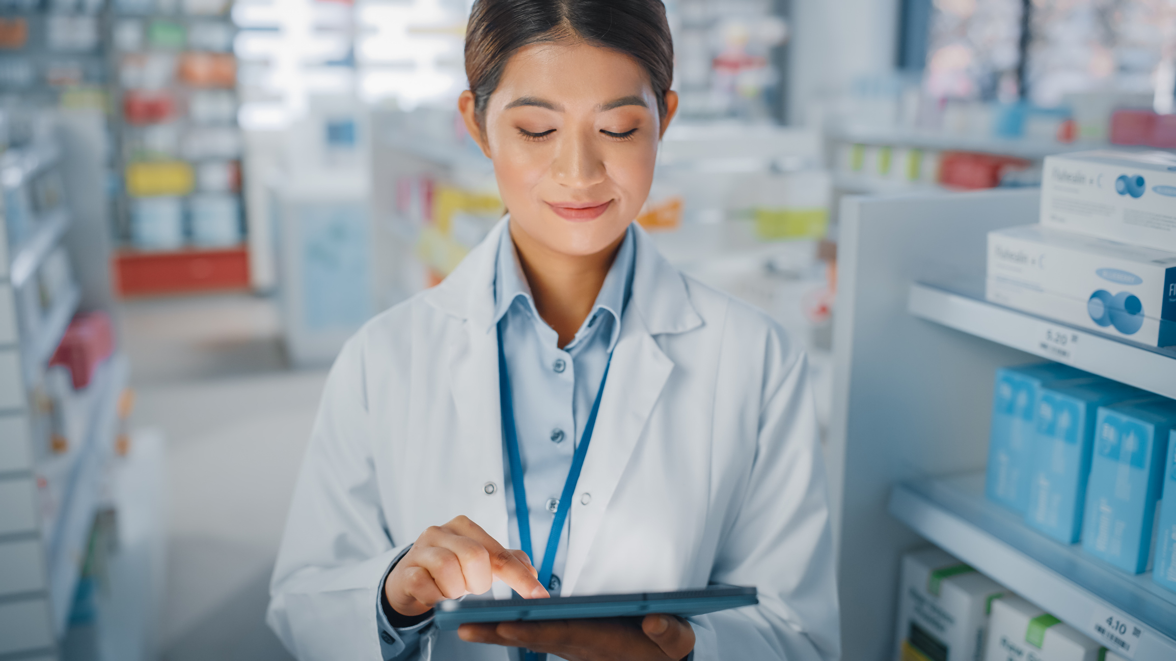 Pharmacist Completing CE Requirements for Pharmacist License Renewal