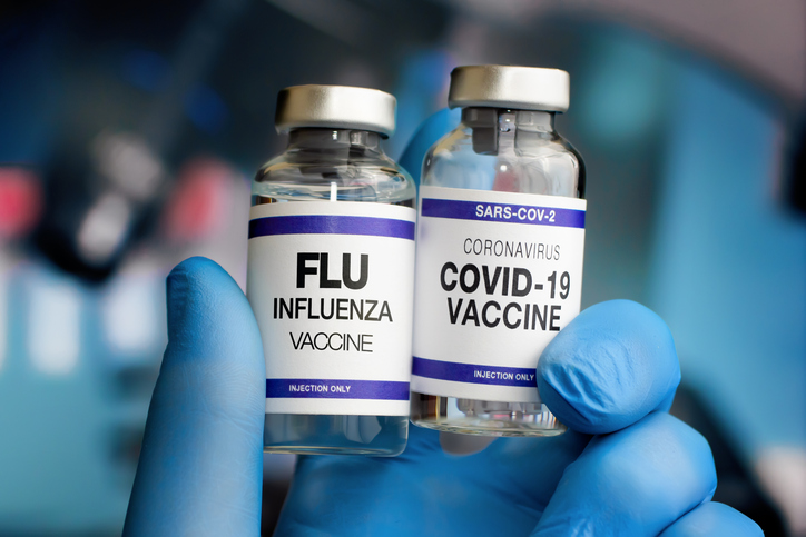 close up of flu and covid vaccines