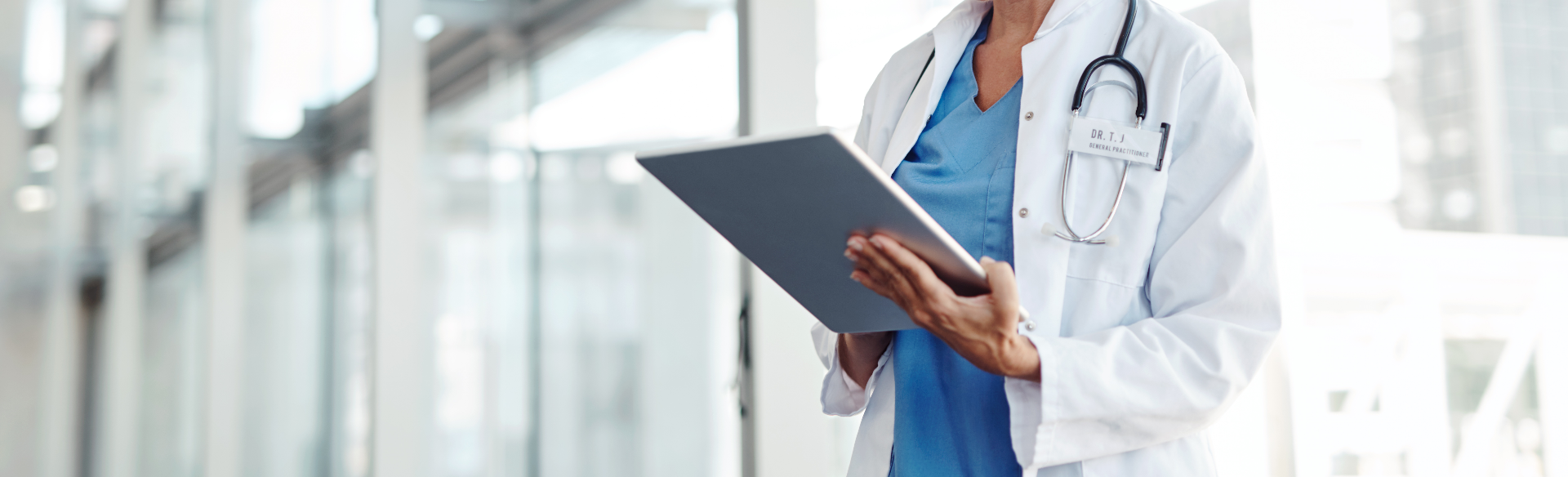 close up of a nurse practitioner on a tablet device