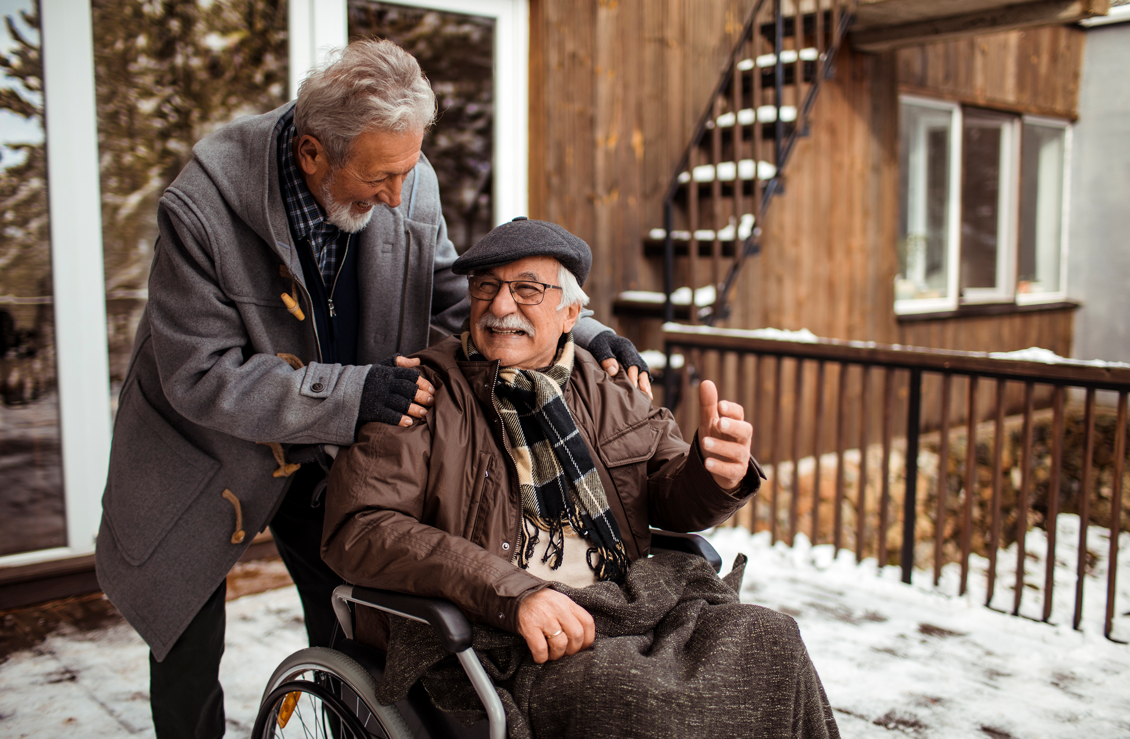 nurse helping a senior patient in a wheelchair